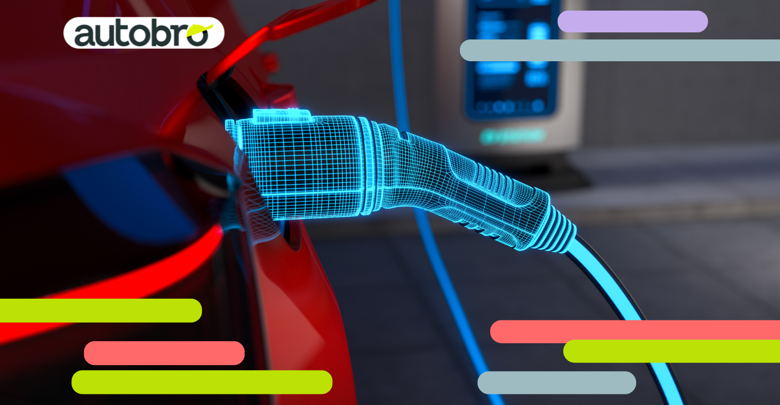 Auto elettrica in ricarica presso una colonnina in città moderna